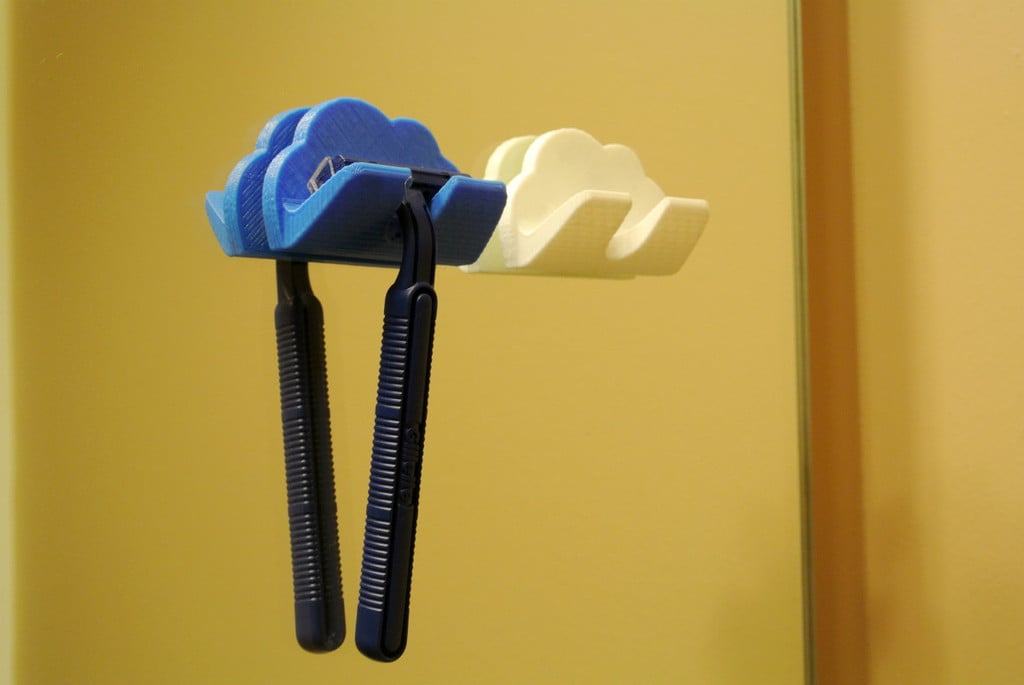 Razor holder shaped like a cloud or shaving cream
