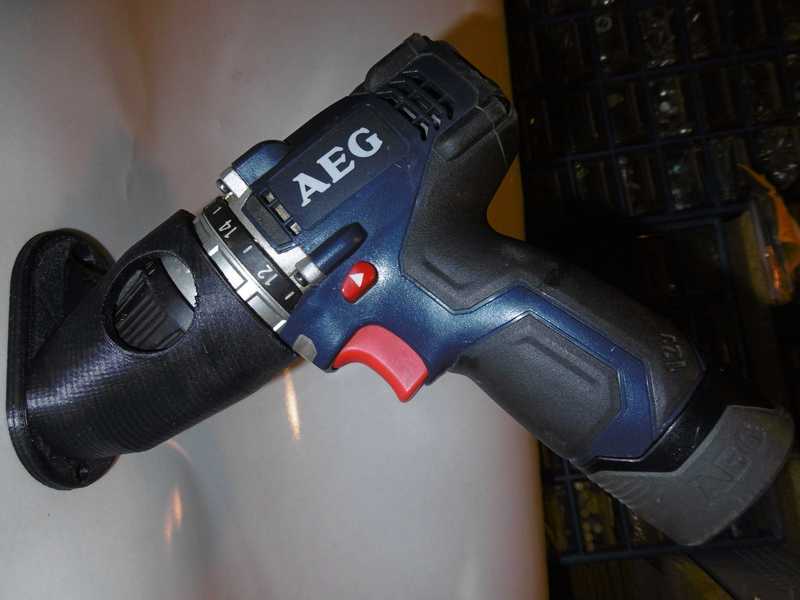 Wall-mounted holder for AEG cordless drill